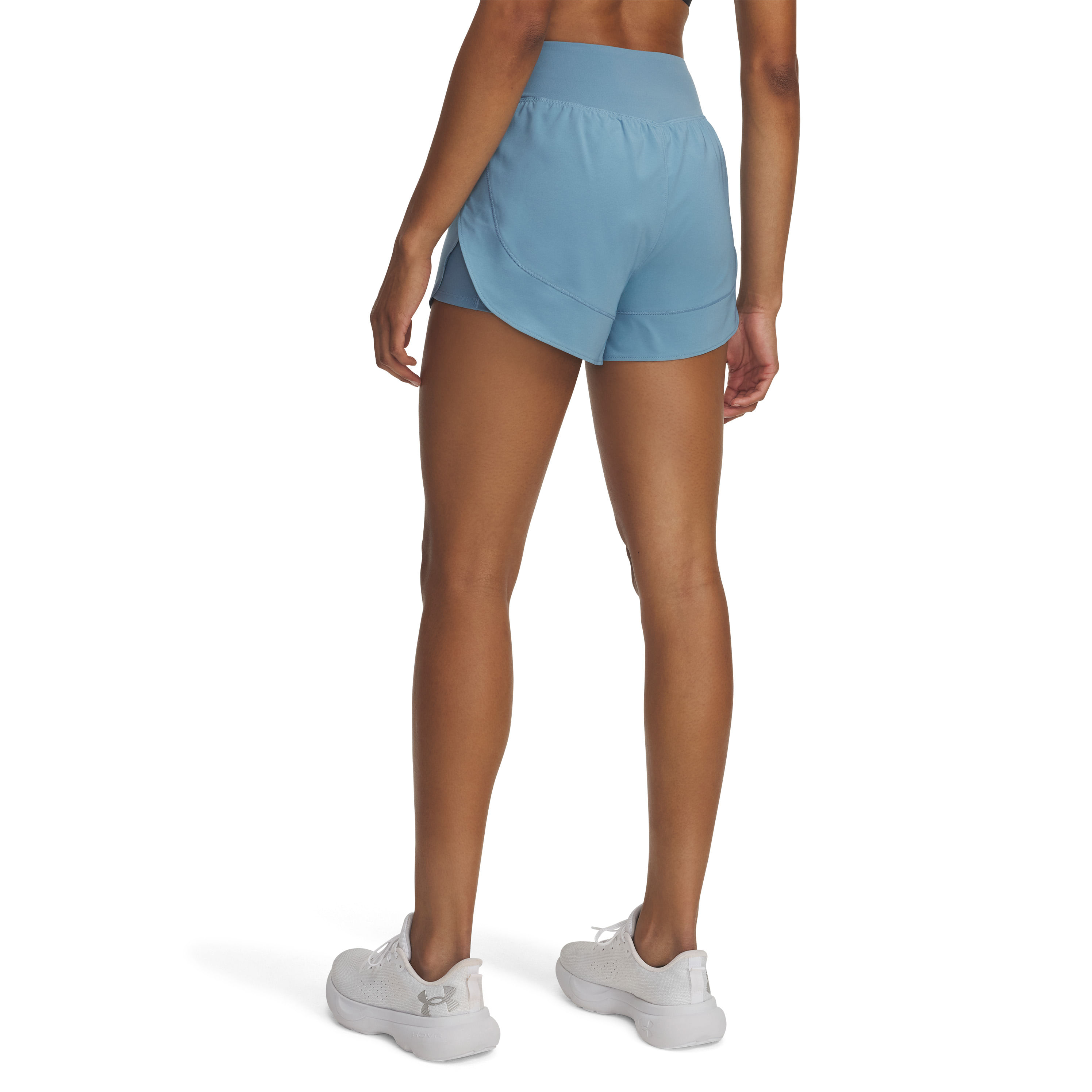 Detalhe do shorts feminino Under Armour azul claro mostrando tecido e design